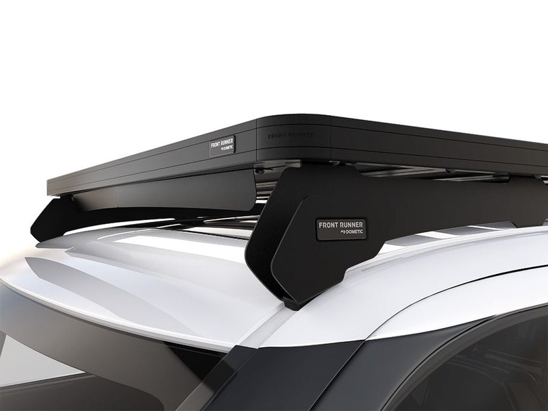 Load image into Gallery viewer, Front Runner Slimline II Roof Rack Kit installed on a 2022 Toyota Sequoia, showcasing the rack's sleek design and durable construction.