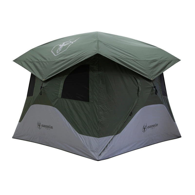 Load image into Gallery viewer, Gazelle Tents T4 Hub Tent set up outdoors, green and gray colors with logo visible.
