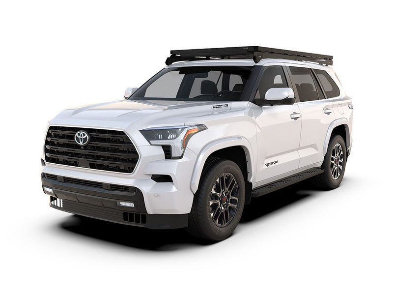 Load image into Gallery viewer, White 2022 Toyota Sequoia with Front Runner Slimline II Roof Rack Kit installed on top, three-quarter view.