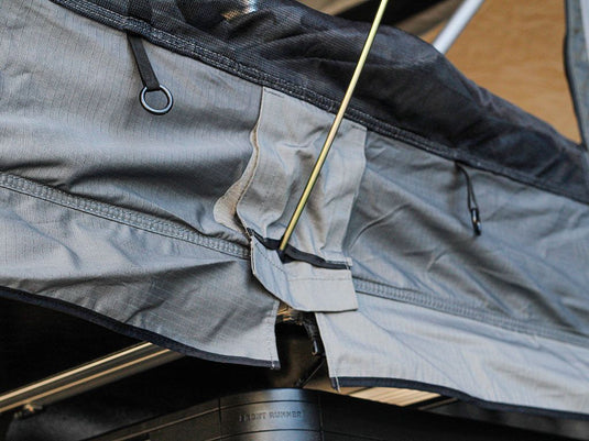 Close-up view of Front Runner Roof Top Tent fabric and tensioning system.