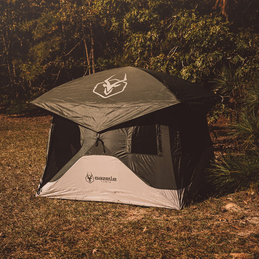 Gazelle Tents T4 Hub Tent set up in a natural outdoor camping environment.