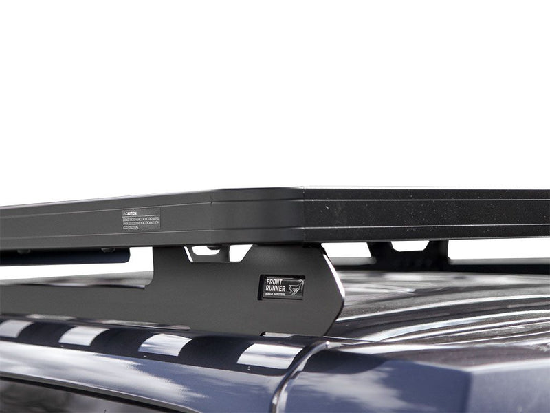 Load image into Gallery viewer, Front Runner Slimline II Roof Rack Kit installed on Toyota 4Runner 5th Generation, durable vehicle storage upgrade.
