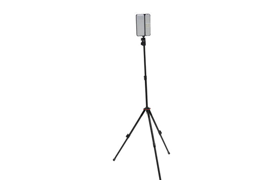 Freespirit Recreation ReadyLight Mini Solar Light in Black Ops color mounted on a tripod stand
