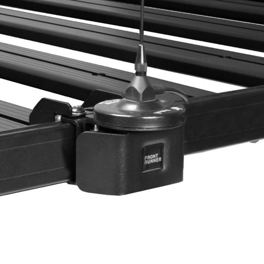 Front Runner antenna mount installed on vehicle rack with logo visible