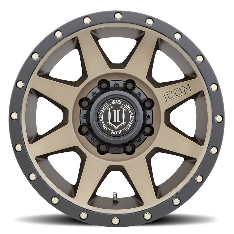 Load image into Gallery viewer, Bronze ICON Vehicle Dynamics Rebound wheel with black trim and logo center cap, isolated on white background.

