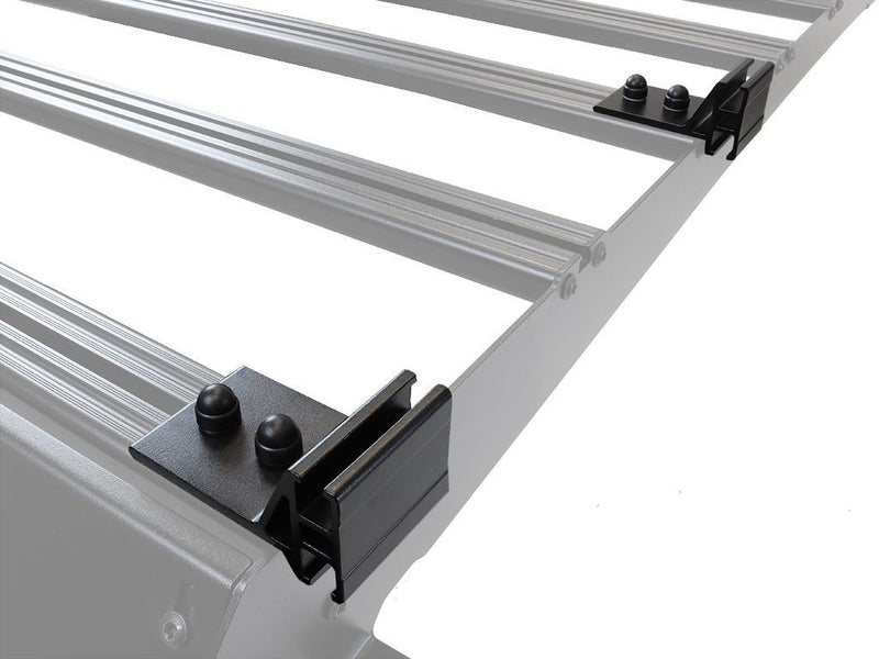 Load image into Gallery viewer, Close-up view of Front Runner Toyota 4Runner 2010-Current Slimsport Roof Rack Kit showing the sturdy aluminum construction and mounting brackets.
