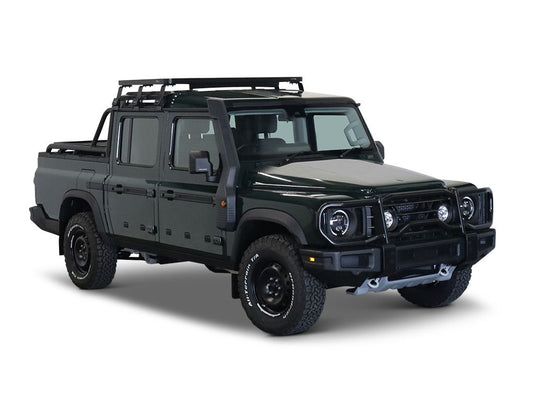 Alt text: inchFront Runner Ineos Grenadier Quartermaster 2023 Slimline II half roof rack kit on a rugged off-road vehicleinch