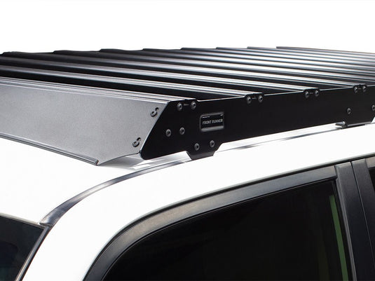 Front Runner Slimsport Roof Rack Kit installed on Toyota 4Runner 2010-current model, close-up side view.