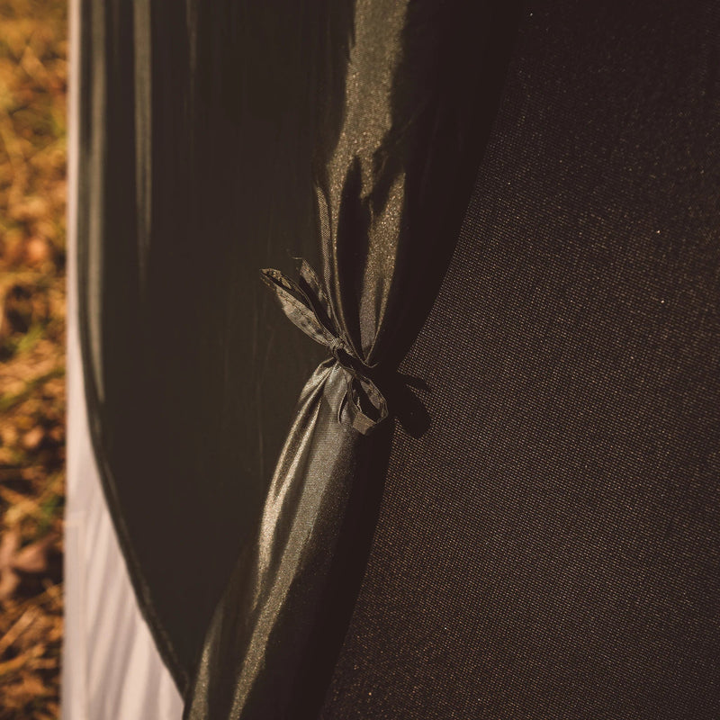 Load image into Gallery viewer, Close-up view of a Gazelle T4 Hub Tent fabric with tie-back detail for ventilation during camping.
