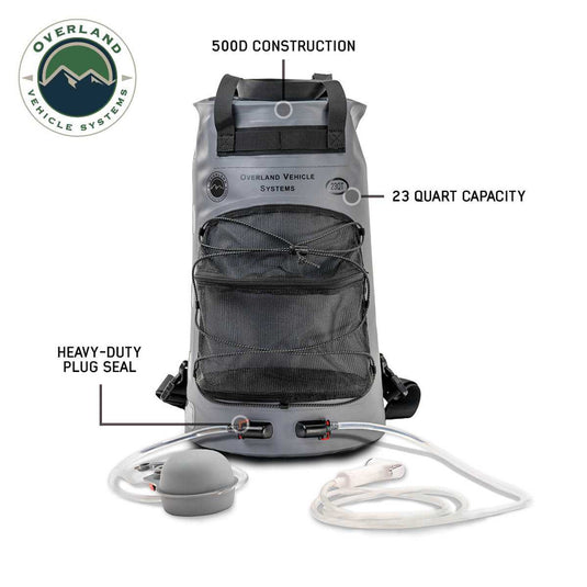 Alt text: inchOverland Vehicle Systems portable camp shower, 23 QT capacity, with nozzle and accessories, featuring heavy-duty plug seal and 500D construction material, ideal for outdoor camping and overlanding.inch