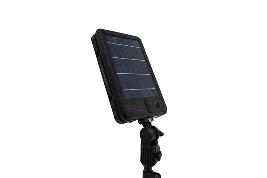 Freespirit Recreation ReadyLight Mini Solar Light in Black Ops color featuring compact design and solar panel on stand.