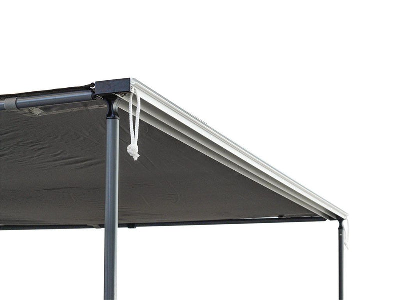 Load image into Gallery viewer, Front Runner Easy-Out Awning 1.4M with grey fabric and sturdy aluminum frame, isolated on white background.
