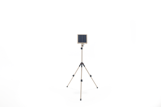 Freespirit Recreation ReadyLight Gen2 with solar panel on adjustable tripod stand isolated on white background.