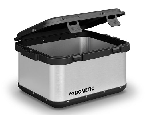 Alt text: "Front Runner Dometic 50L Portable Gear Storage, hard-sided and slate gray, with lid open showing the spacious interior."