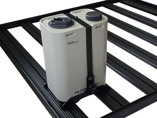 Alt text: inchFront Runner Dometic 11L water jug with hydration rack bracket mounted on black vehicle roof rack, featuring secure strap and easy-fill lid.inch