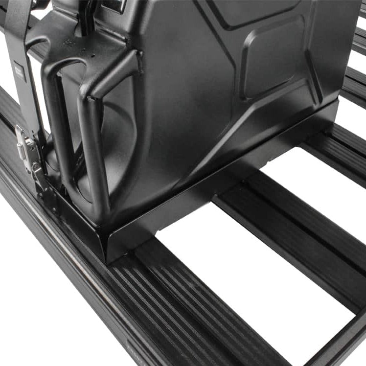 Load image into Gallery viewer, Front Runner Single Jerry Can Holder securely mounted on black roof rack, close-up view on detail and latch mechanism.

