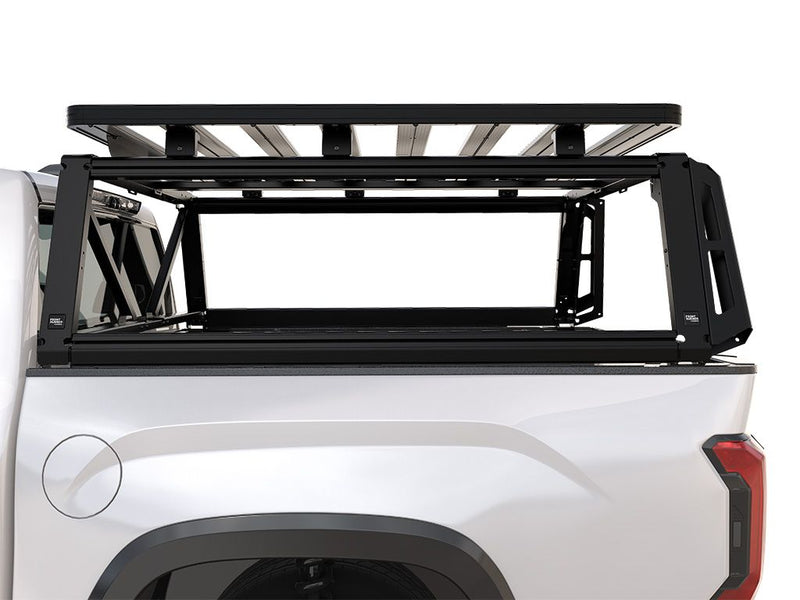 Load image into Gallery viewer, Alt text: &quot;2022 Toyota Tundra CrewMax with Front Runner Pro Bed Rack Kit installed, showcasing the sturdy frame and cargo space on the truck bed for outdoor gear.&quot;
