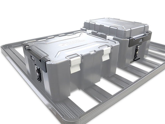 Alt text: "Front Runner Wolf Pack Pro storage boxes securely mounted on vehicle rack using the MKII Rack Mounting Brackets."