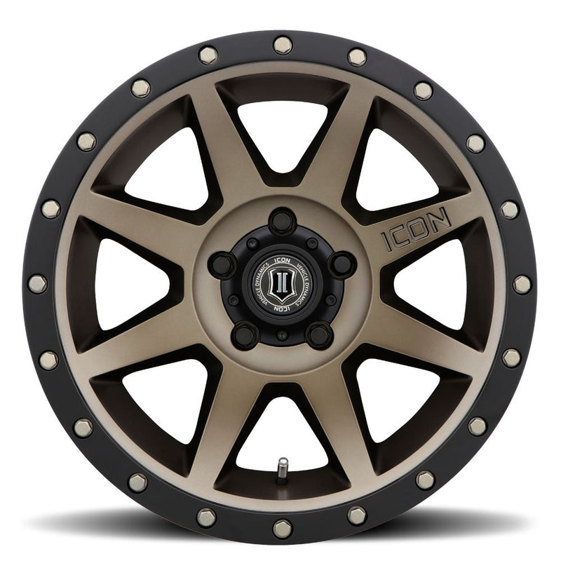 Load image into Gallery viewer, ICON Vehicle Dynamics Rebound wheel in bronze with black accents and visible logo on center cap, high-performance off-road rim design
