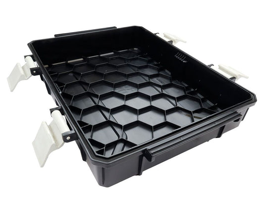 Alt text: "Front Runner Wolf Pack Pro Hi-Lid durable storage container with honeycomb design and secure latching system, ideal for vehicle organization and gear protection."