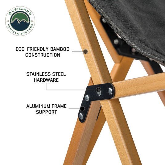 "Close-up of Overland Vehicle Systems Kick It Camp Chair highlighting the eco-friendly bamboo construction, stainless steel hardware, and aluminum frame support."
