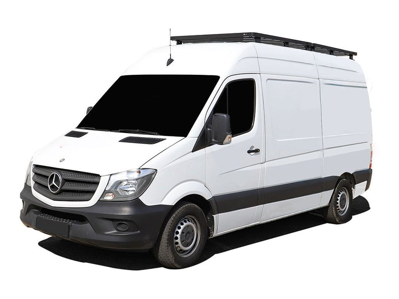 Load image into Gallery viewer, Mercedes Benz Sprinter with Front Runner Slimline II Roof Rack Kit installed, showing side profile of the vehicle on a white background.
