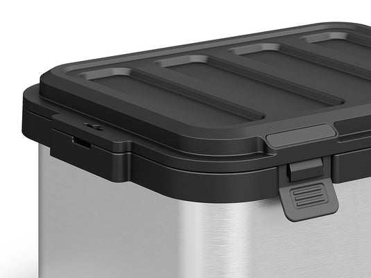 Alt text: Close-up view of a Front Runner Dometic Portable Gear Storage hard-sided 50L container in slate color, showcasing the durable latch and textured lid design.