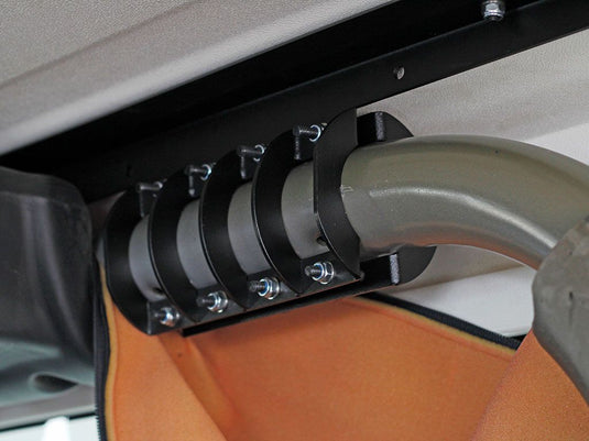 Close-up installation view of the Front Runner Extreme Roof Rack Kit brackets on a Jeep Wrangler JK 2 Door (2007-2018)