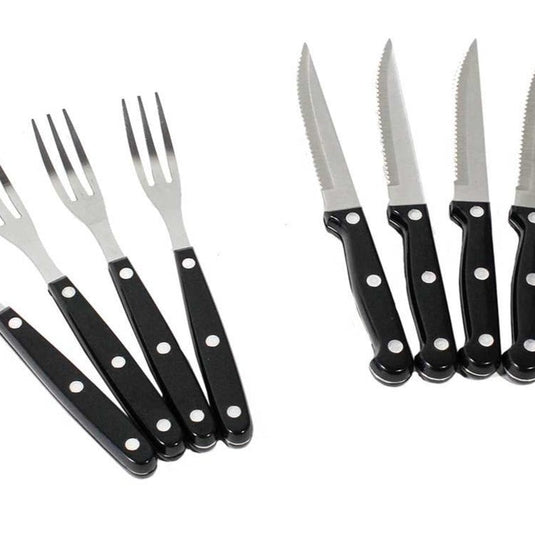 Stainless steel camping utensils set including knives and forks with black handles from Front Runner Camp Kitchen Utensil Set.