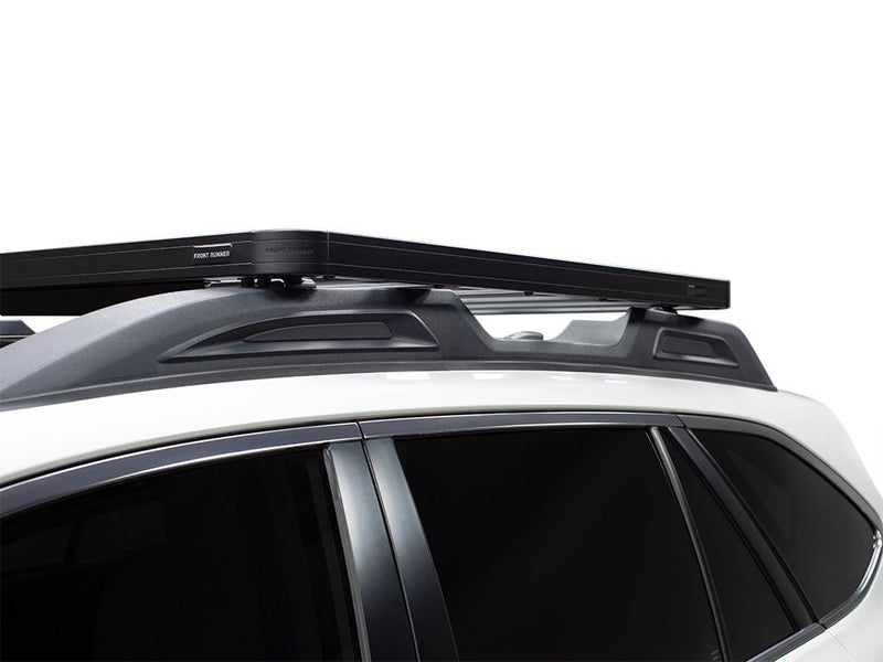 Load image into Gallery viewer, Front Runner Subaru Outback 2015-2019 Slimline II Roof Rail Rack Kit installed on vehicle, showing side and top view.
