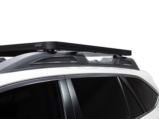 Front Runner Subaru Outback 2015-2019 Slimline II Roof Rail Rack Kit installed on vehicle, showing side and top view.