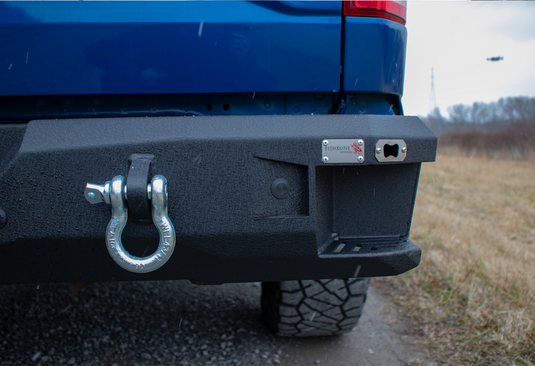 Fishbone Offroad logo on Pelican Rear Bumper for 2015-Current Ford F-150 with tow hook detail.