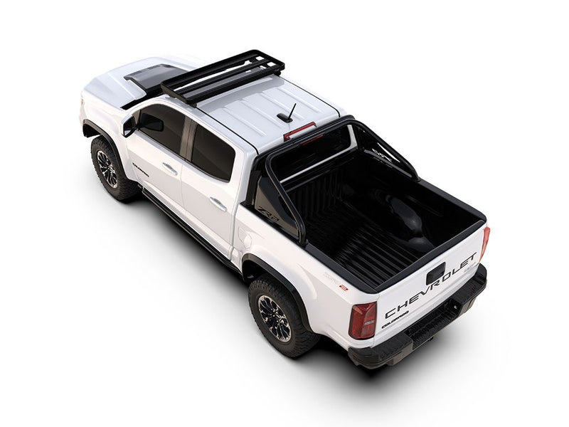 Load image into Gallery viewer, Chevrolet Colorado with Slimline II Roof Rack Kit by Front Runner for GMC Canyon ZR2 2nd Gen 2015-2022, white cab over camper configuration.
