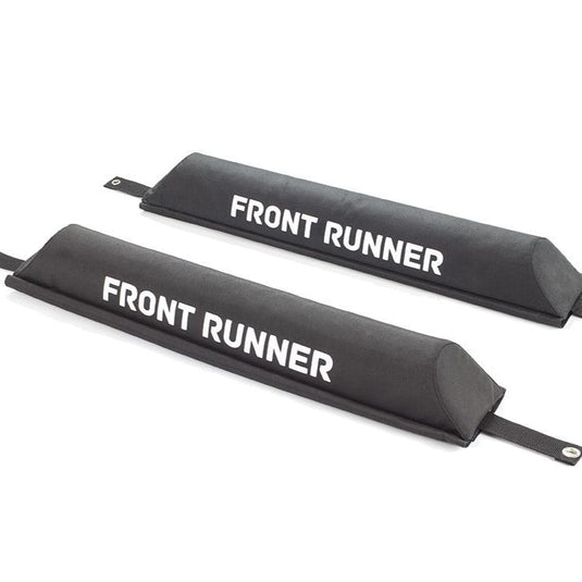 Front Runner rack pad set for vehicle roof racks showing brand logo on black cushioned material with securing straps.