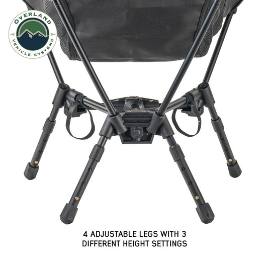 Compact camping chair by Overland Vehicle Systems with adjustable aluminum frame and collapsible design for outdoor use.