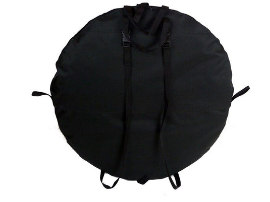 Alt text: "Compact and portable Front Runner Flip Pop Tent in a closed position with black cover and carrying handles."