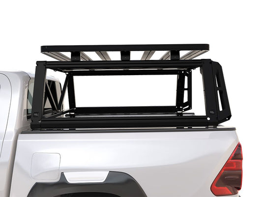 Alt text: "Front Runner Pro Bed Rack Kit for 2016-Current Toyota Hilux Revo Double Cab mounted on pickup truck bed for enhanced cargo carrying capability."