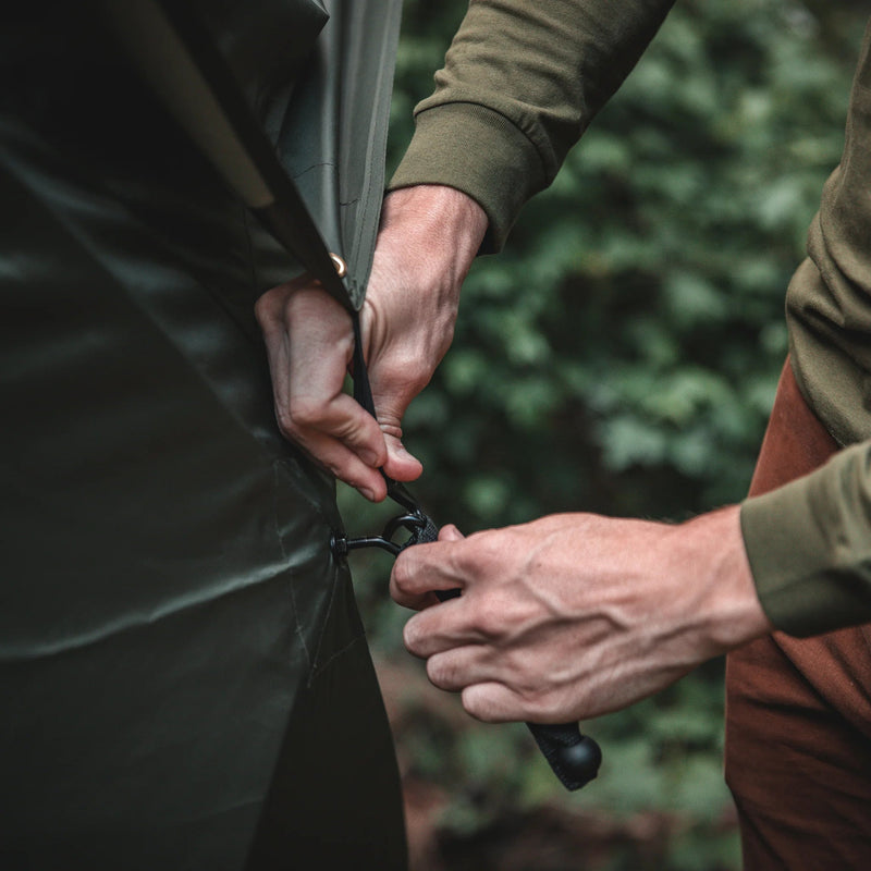 Load image into Gallery viewer, Close-up of setup process for Gazelle Tents T4 Hub Tent highlighting easy-to-attach poles in camping environment.
