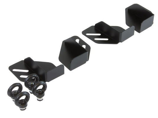 Alt text: "Front Runner Adjustable Rack Cargo Chocks with black finish, including mounting brackets and screws, isolated on white background."