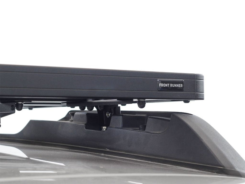 Load image into Gallery viewer, Close-up of a Front Runner Slimline II roof rack kit installed on a Subaru Outback, model years 2015-2019.
