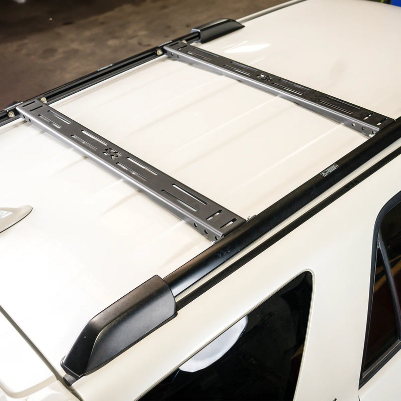 Load image into Gallery viewer, Cali Raised LED Roof Cross Bars For 2010-2024 Toyota 4Runner
