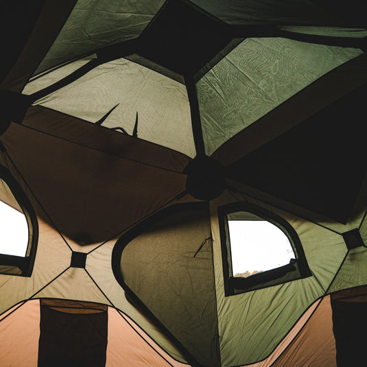 Interior view of Gazelle Tents T4 Hub Tent Overland Edition showing spacious design and window ventilation.