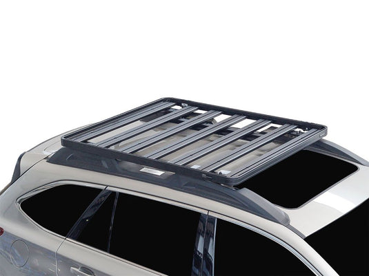 Front Runner Slimline II Roof Rail Rack Kit installed on a 2015-2019 Subaru Outback, enhancing versatility for cargo management.