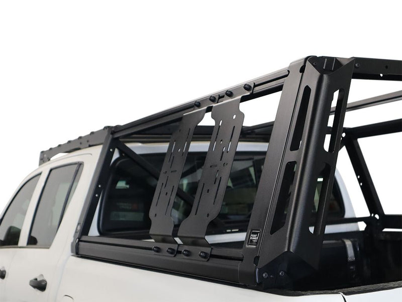 Load image into Gallery viewer, Alt text: &quot;Front Runner Pro Bed Universal Accessory Mount installed on pickup truck bed for versatile equipment carrying solutions.&quot;
