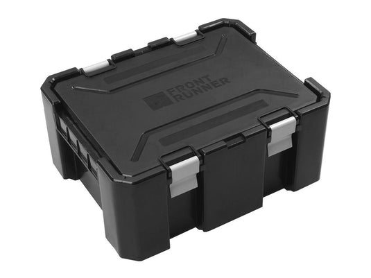 Alt text: "Front Runner 4 Wolf Pack Pro Storage System Kit with asymmetric design in black, durable outdoor gear container."