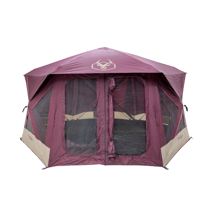 Alt text: inchGazelle Tents T-Hex Hub Tent Overland Edition set up, displaying front entrance and mesh windows, with system logo visible at the peak.inch