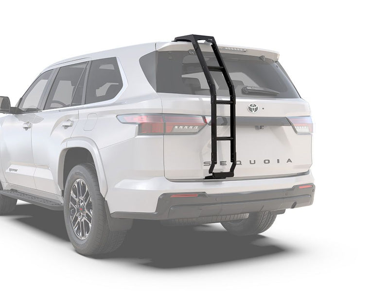 Load image into Gallery viewer, Front Runner Toyota Sequoia 2023 rear ladder accessory mounted on the back of a white SUV.
