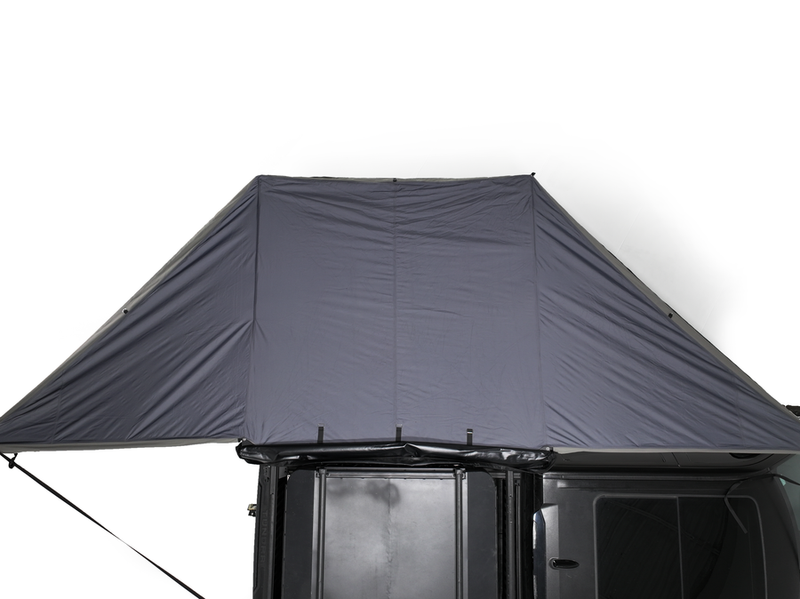 Load image into Gallery viewer, Freespirit Recreation 180 Degree Awning attached to vehicle rooftop for outdoor shelter.
