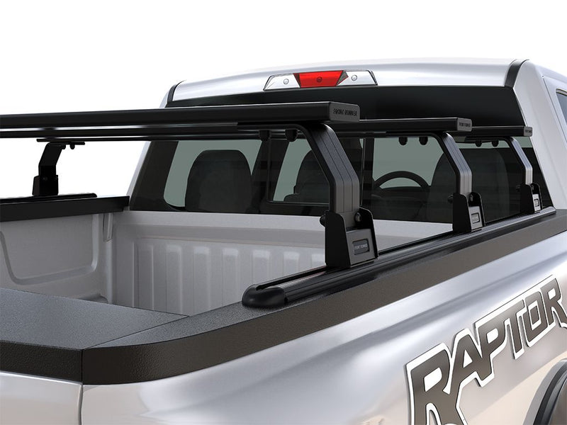 Load image into Gallery viewer, Front Runner Ford F150 Raptor 2009-Current 5.5 Triple Load Bar Kit installed on pickup truck bed for cargo management.
