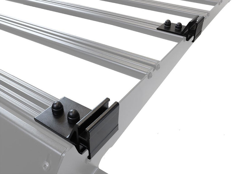 Load image into Gallery viewer, Close-up of the Front Runner Slimsport Roof Rack Kit for Ford F-150 Super Crew 2015-2020, with mounting brackets and lightbar ready feature.
